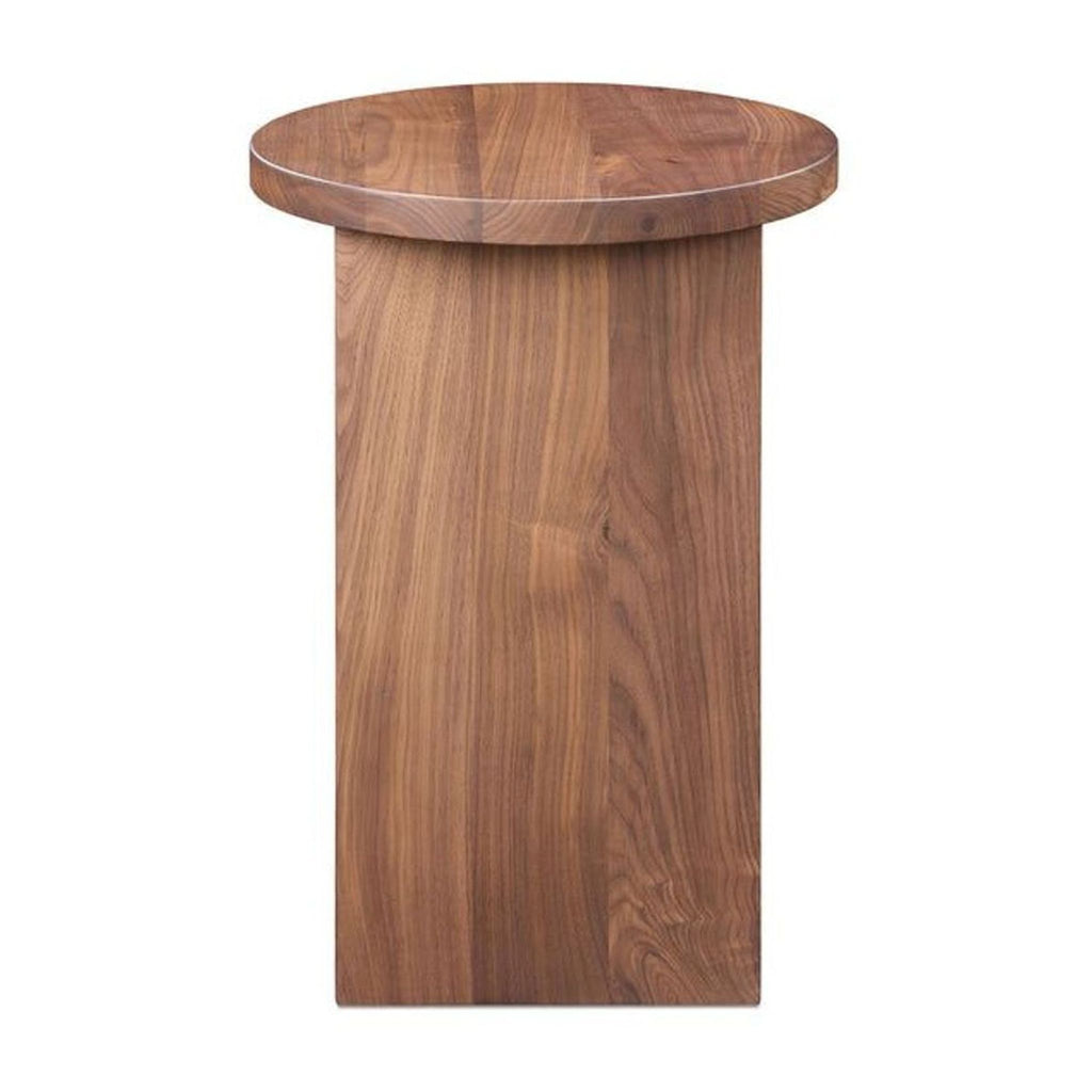 Solid walnut Grace accent table with a round top, featuring a visually striking geometric form.