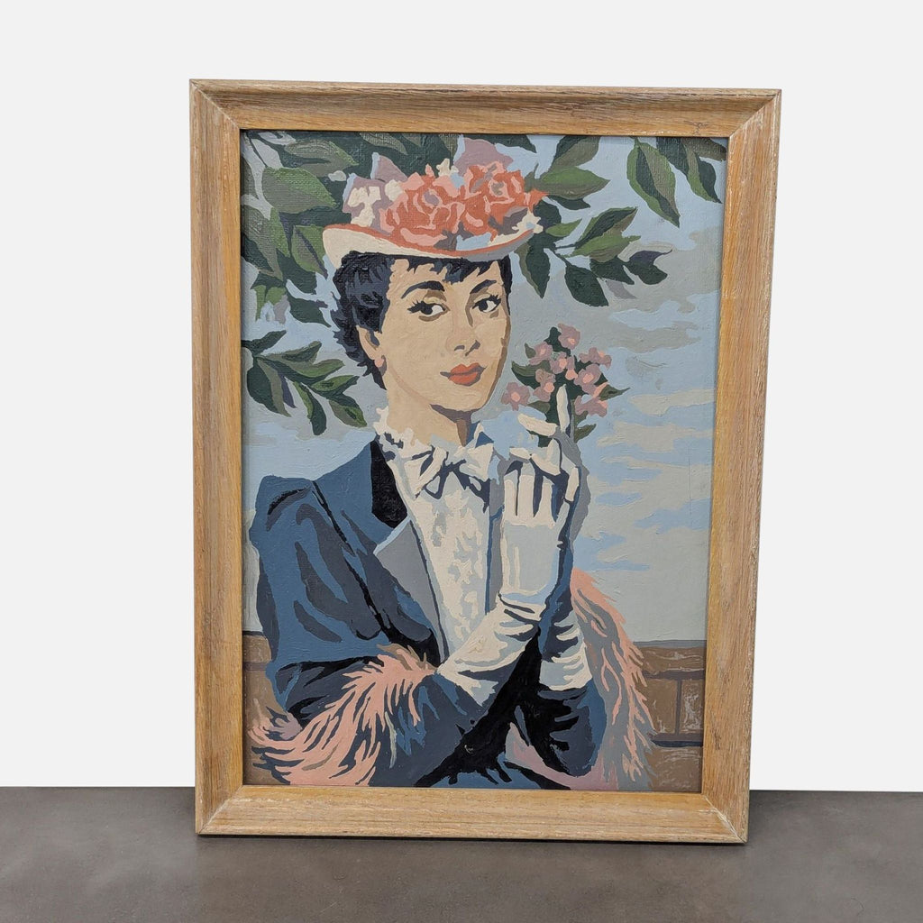A vintage painting of a woman in a hat with flowers, framed in wood.
