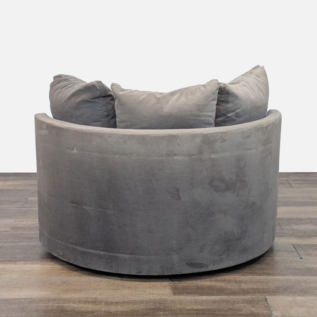 Rear view of the Tillie Grande lounge chair. Curved, cushioned back with soft pillows.