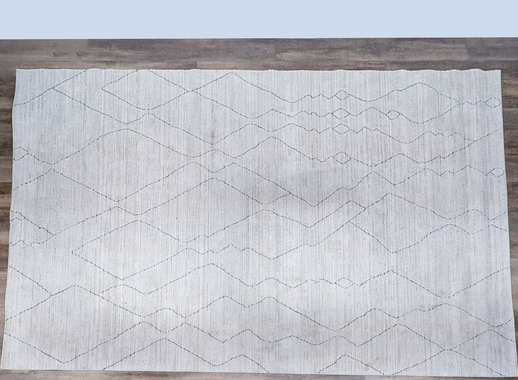 Machine woven polyester rug with diamond patterns from Loloi Rugs.