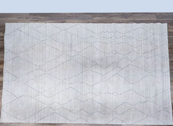 Machine woven polyester rug with diamond patterns from Loloi Rugs.