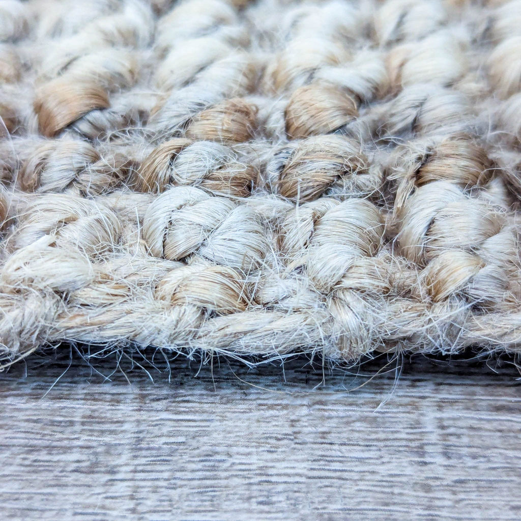 Close-up of woven texture on neutral jute Ikea rug.