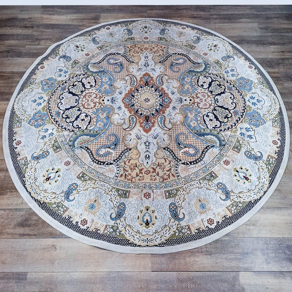 Detailed view of the circular rug with elaborate ornamental design and vibrant colors.