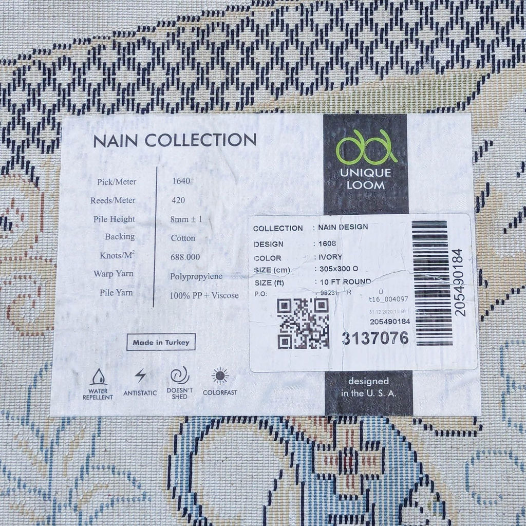 Close-up of the rug's label detailing material, design, and brand specifications.