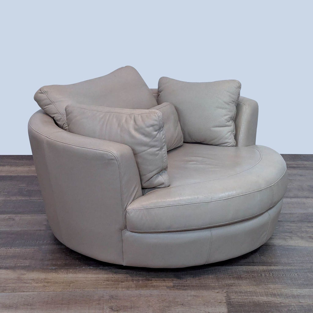 Angled view of Reperch lounge chair, soft leather upholstery.