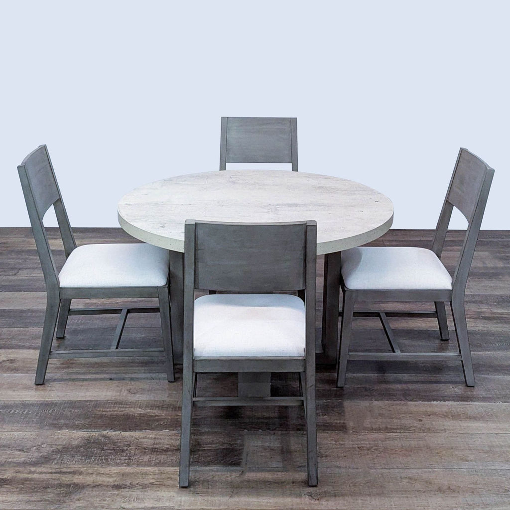 Four-piece dining set with distressed elements, reclaimed pine, and upholstered seating.