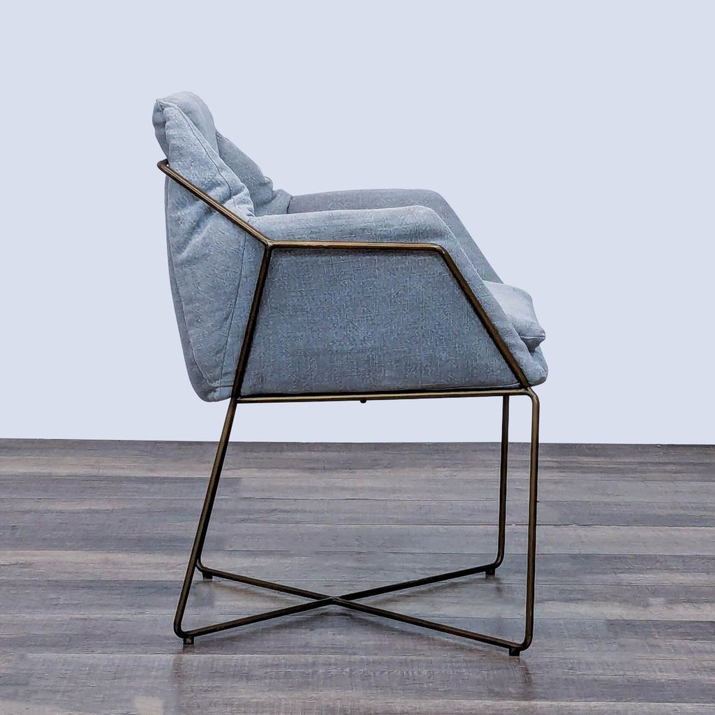 Side view of a lounge chair, metal frame, and plush cushions.