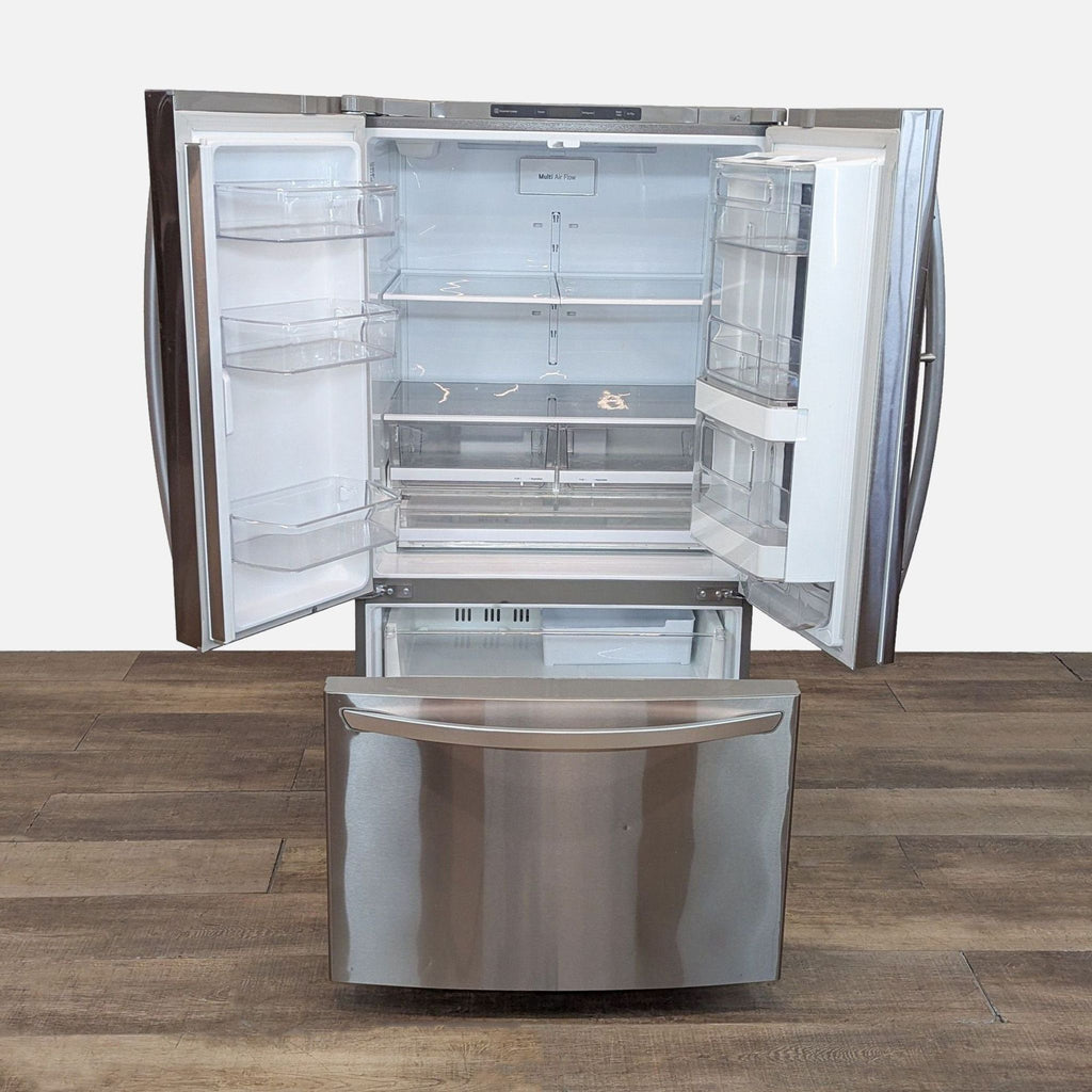 LG stainless steel fridge with French doors open, showing adjustable shelves and storage bins.
