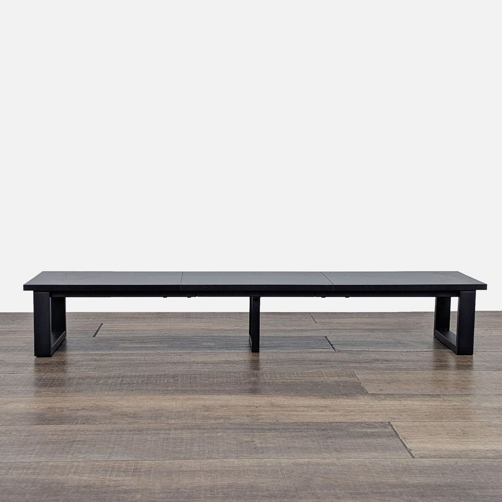 Wood side table with metal legs on a wooden floor, brand Aboxoo.