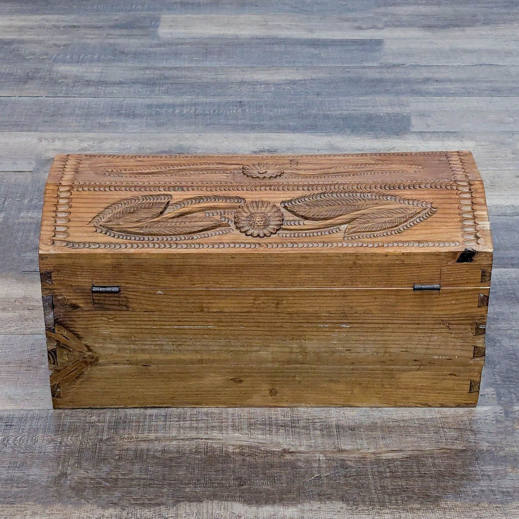 Carved Humpback Trunk with Floral Designs