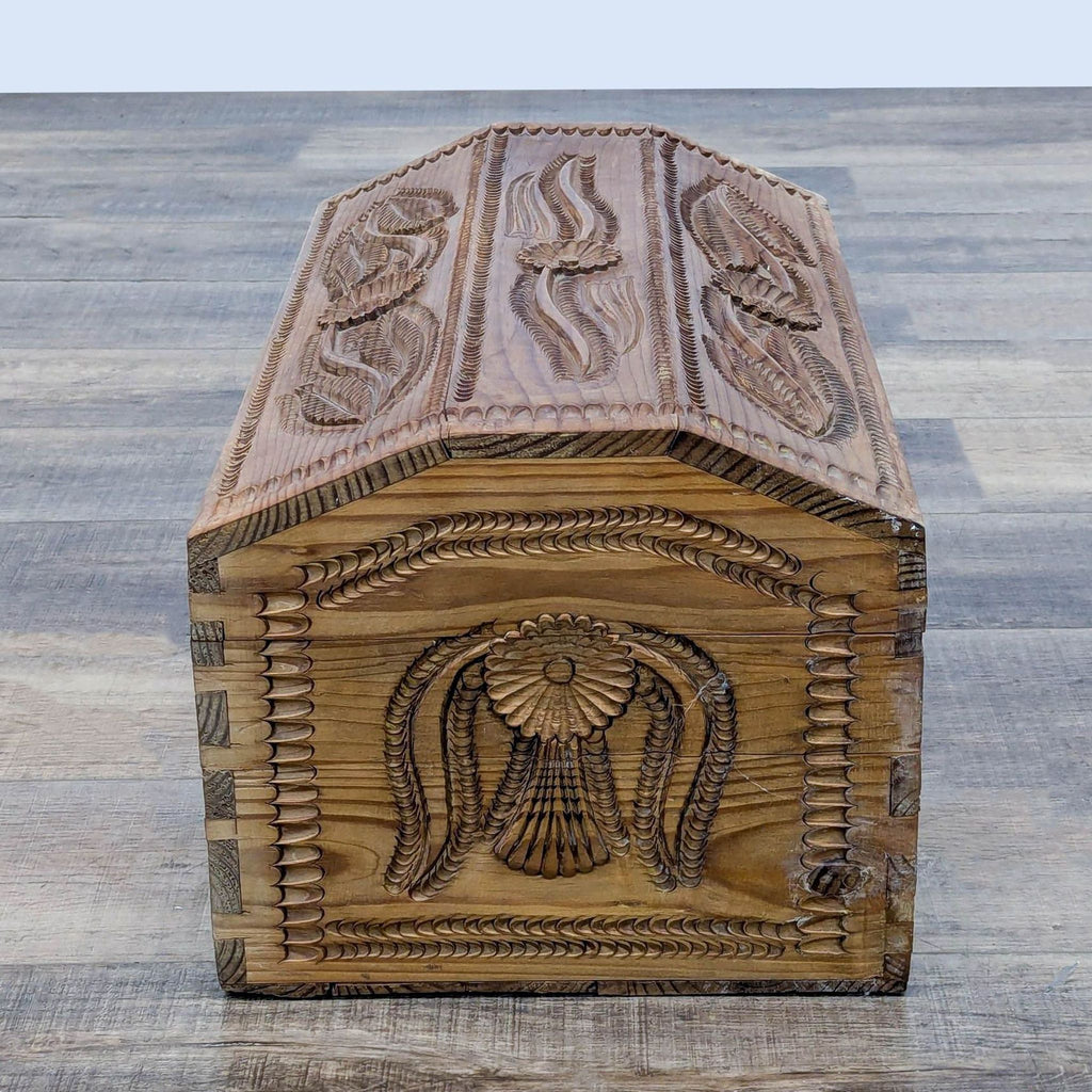 Carved Humpback Trunk with Floral Designs