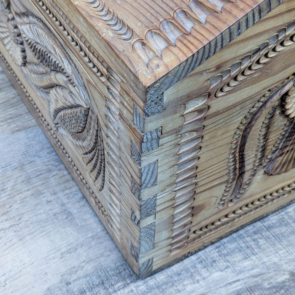 Carved Humpback Trunk with Floral Designs