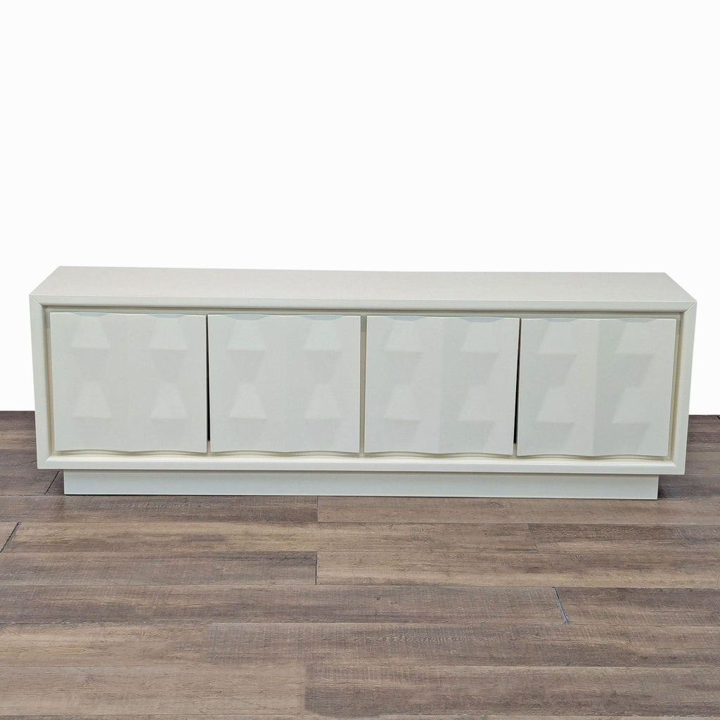 Ivory Lacquer Entertainment Center with a minimalist design and textured doors by Williams Sonoma/West Elm.