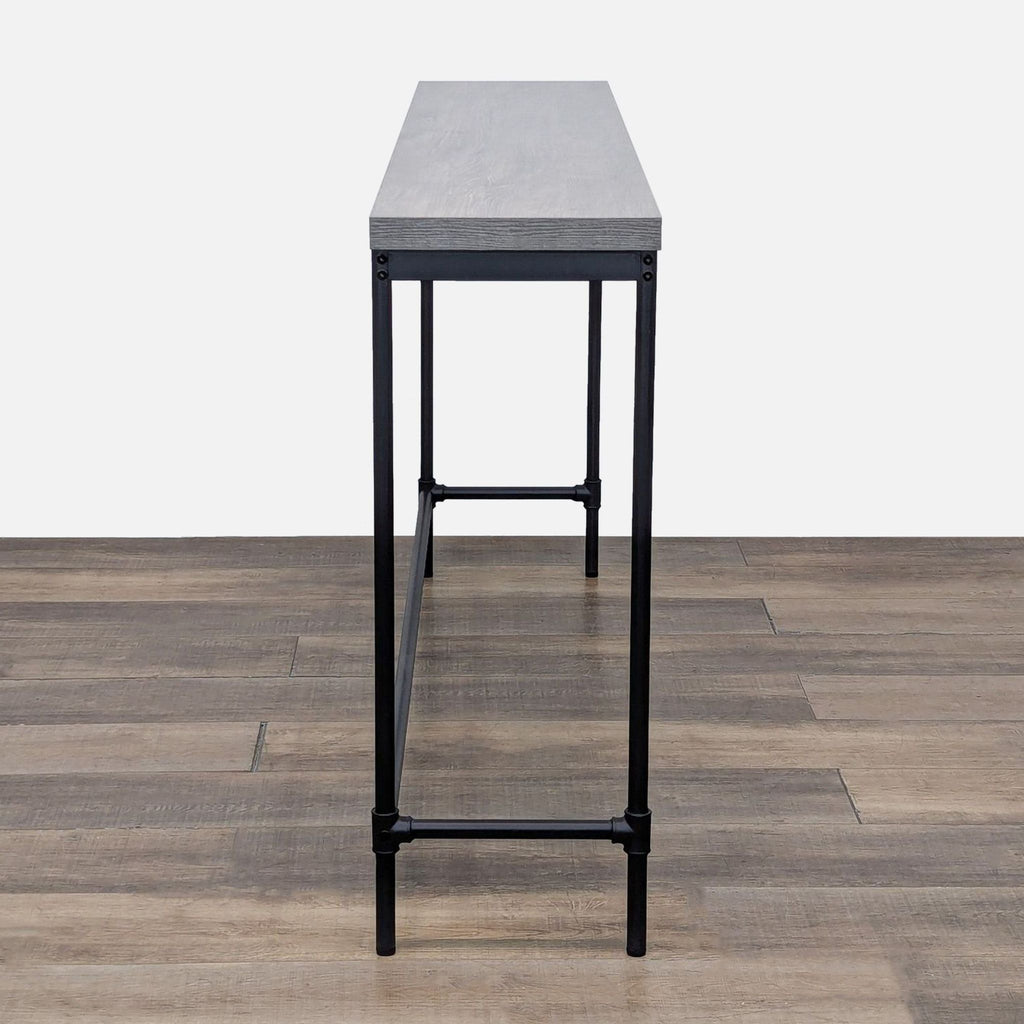 Narrow table by Reperch, featuring a grey finish on an MDF board.