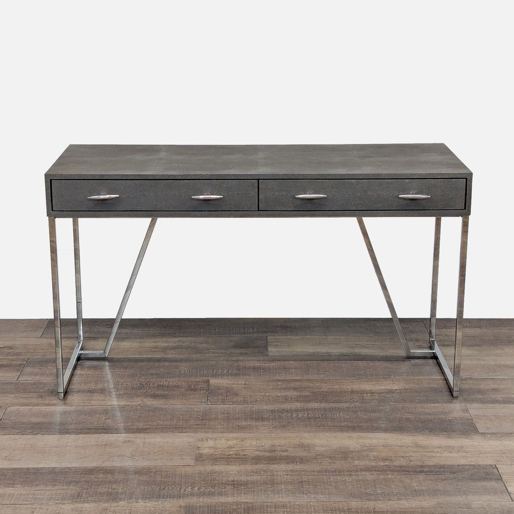 Reperch desk with brown faux shagreen top and stainless steel base.