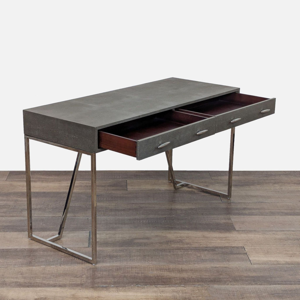 Side view of Reperch desk showing open drawers and textured surface.