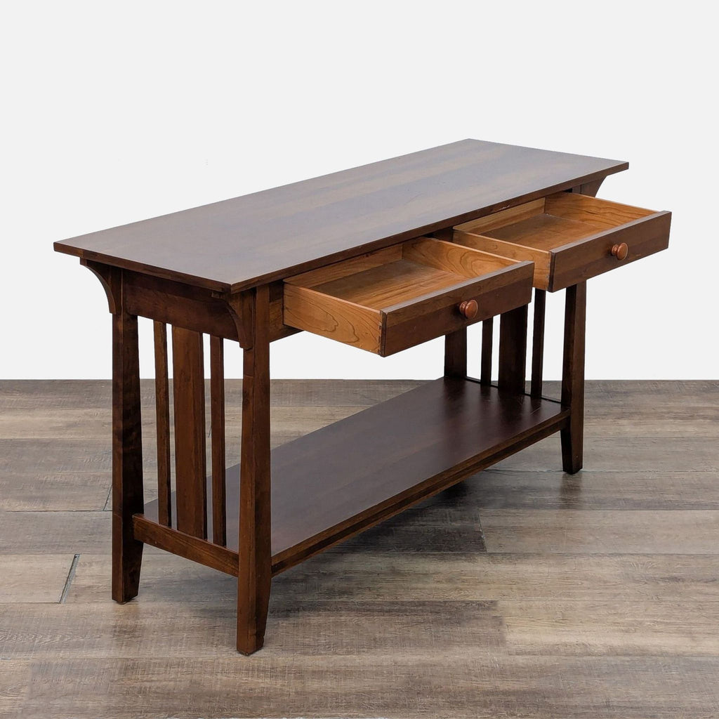 Side table showcasing two open drawers and storage shelf.