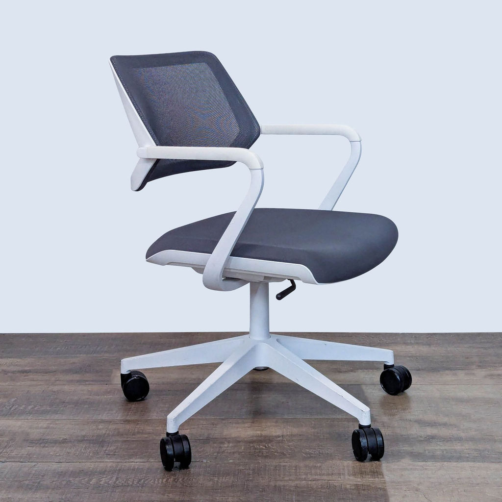 Angled view highlighting Steelcase chair's automatic adjustments and gliding seat.