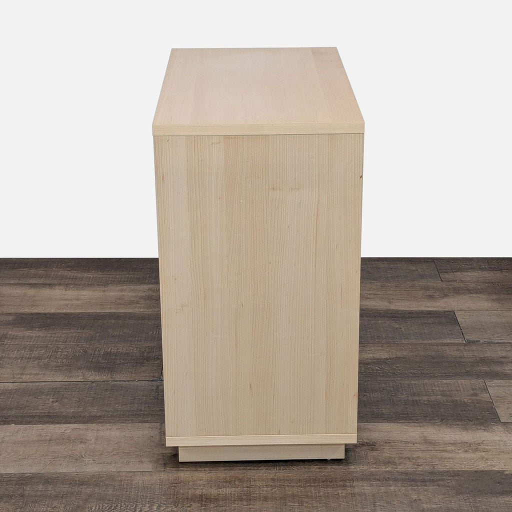 Blu Dot dresser showcasing smooth, self-closing drawers in mixed tones.