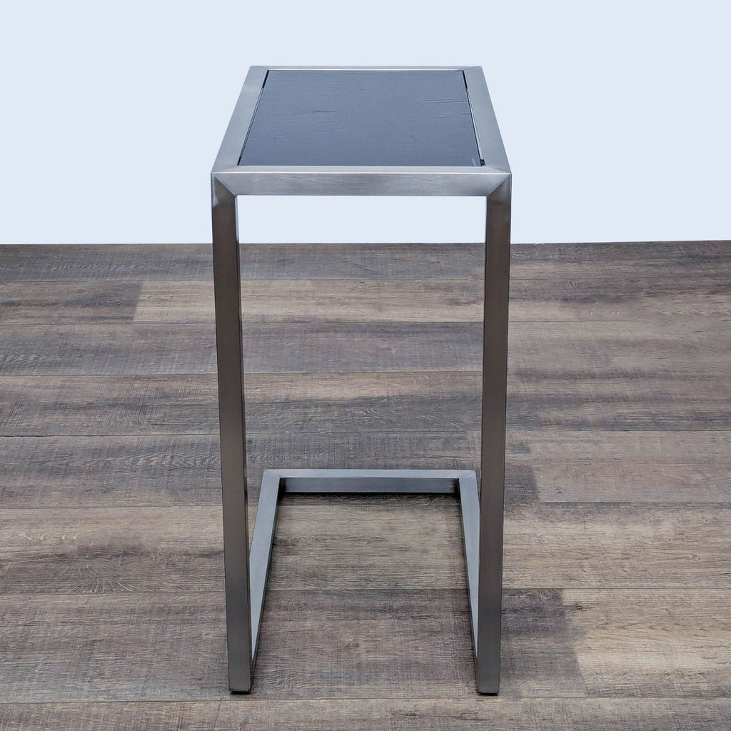 Side view of Reperch End Table, modern minimalist design.