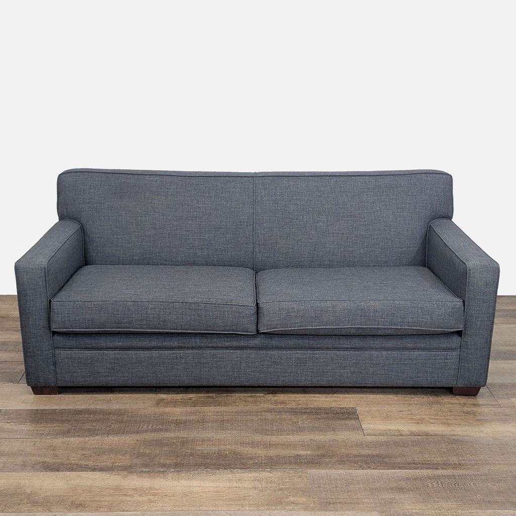 Reperch 3-seat sofa with welted track arms and boxed seat cushions, featuring tapered wood feet.