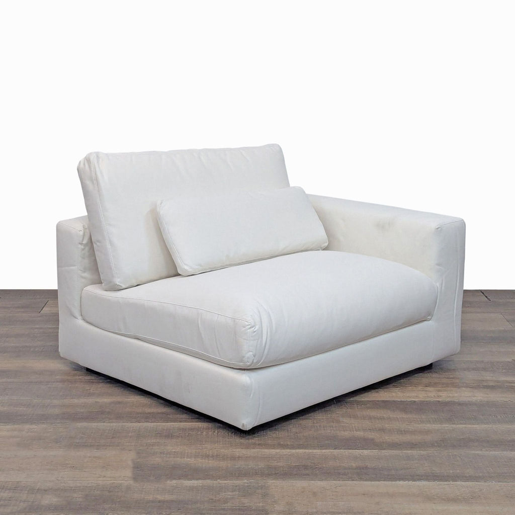 Right arm sectional chair with thick cushions and removable slipcover, ideal for modern decor.