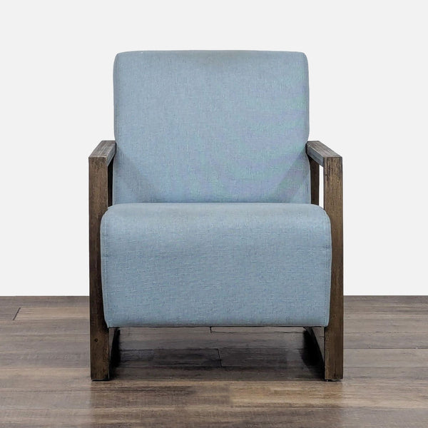Front view of a light blue accent chair with wooden frame.