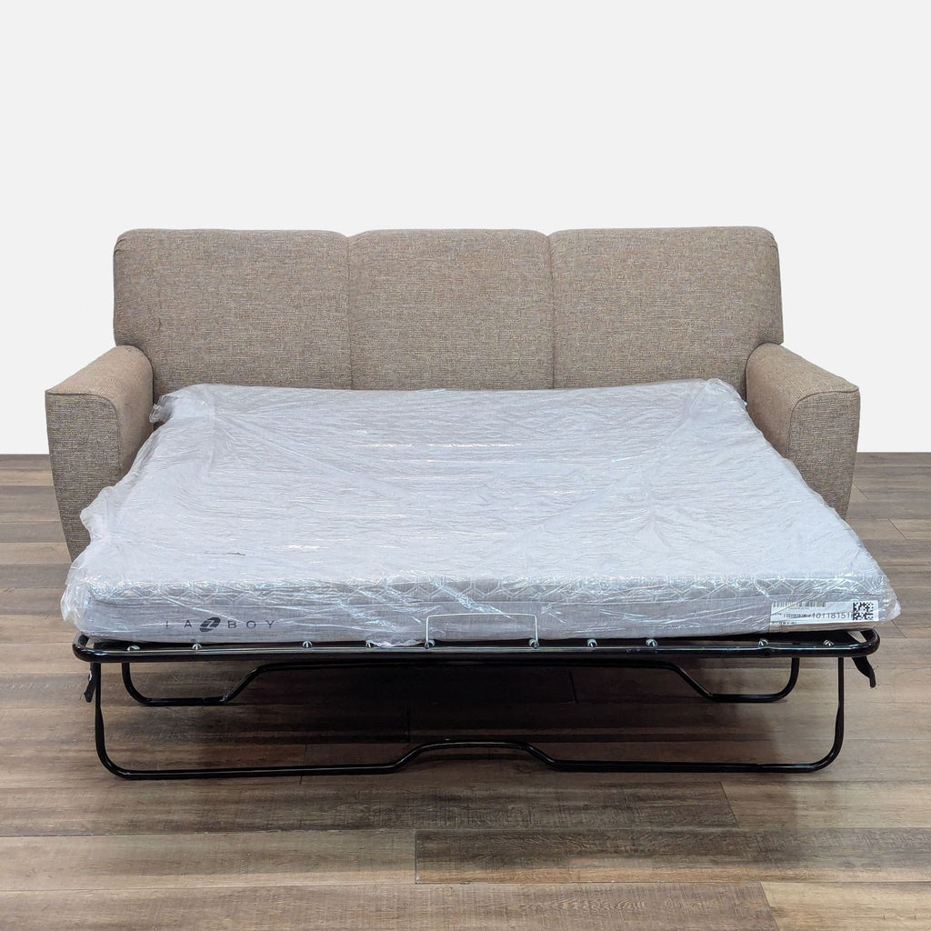 La-Z-Boy sleeper sofa extended to full-size bed.