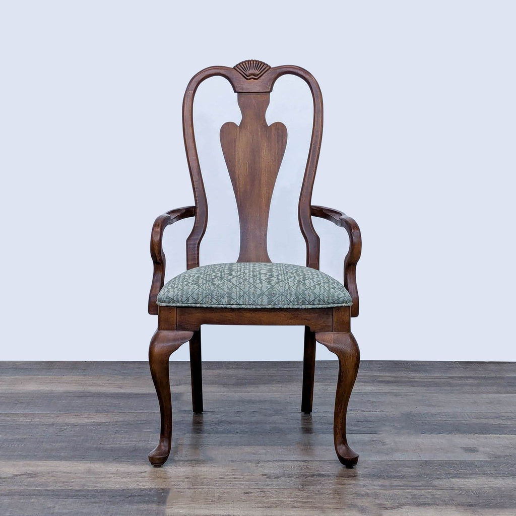 Single Drexel Heritage dining chair with elegant wooden design and green cushioned seat.