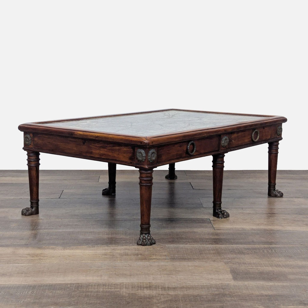 Side view of Reperch coffee table with paw feet and hardware, highlighting dual side drawers.