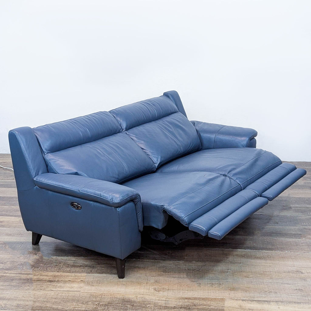 Reclining 3-seat sofa in blue leather with dual power and USB ports.