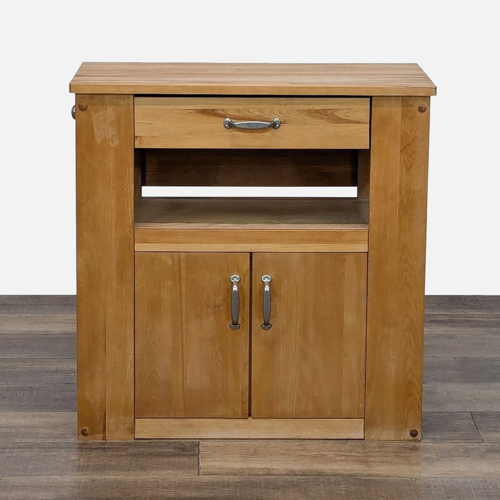 Compact wooden kitchen island with drawer, cabinet, and shelving.