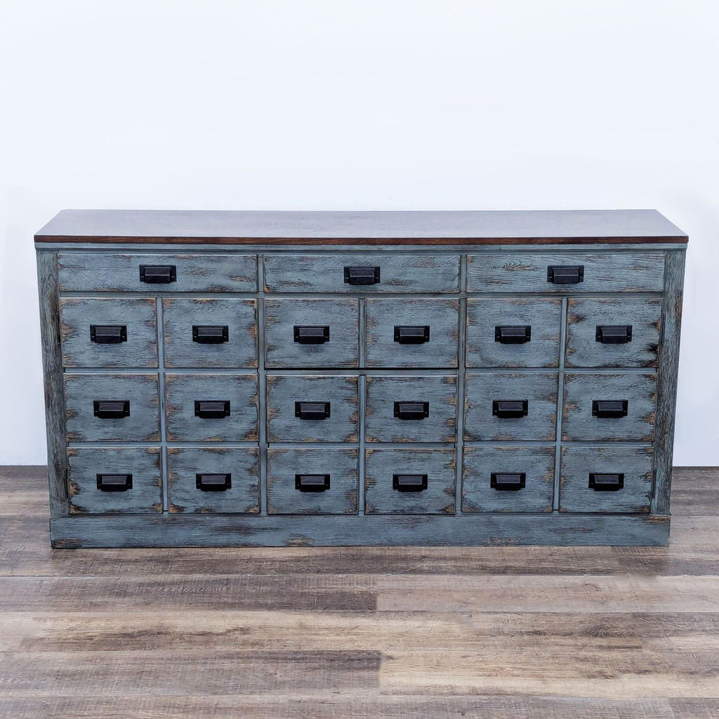 Solid hardwood console in distressed sage green with espresso wood top and black metal hardware.