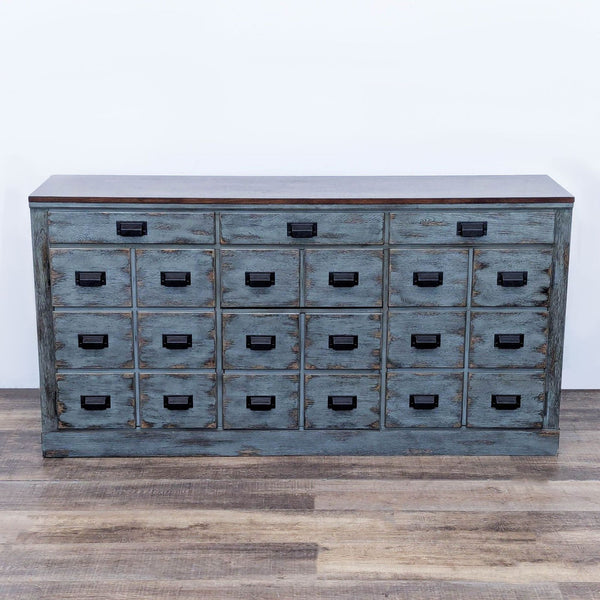 Solid hardwood console in distressed sage green with espresso wood top and black metal hardware.