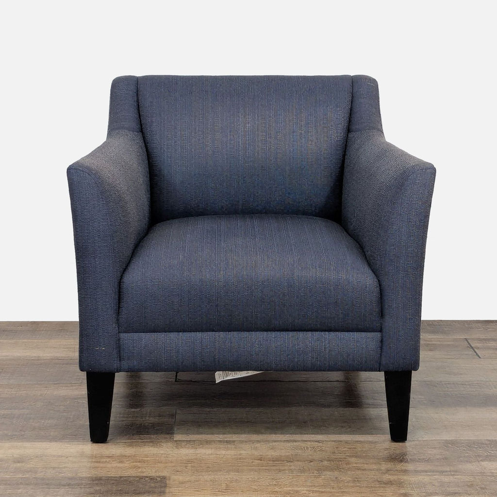 1. Blue lounge chair with high track arms, tapered legs, and synthetic upholstery from Crate & Barrel.