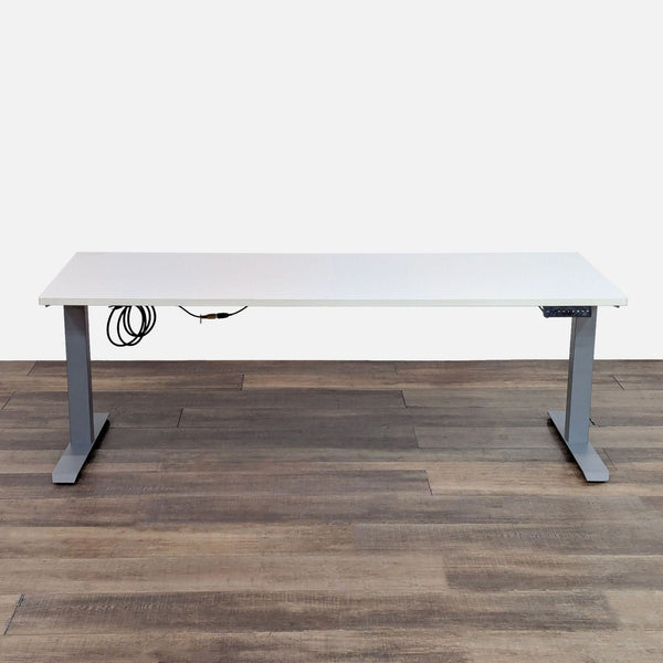 AMQ desk with laminate top and adjustable metal T legs. 