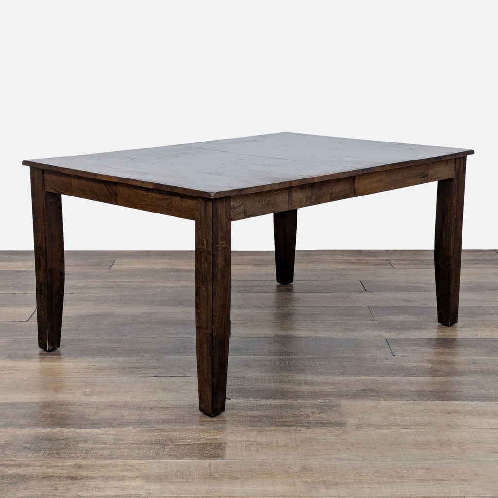 Reperch table, extendable design, resting on wood floor, in dining category.