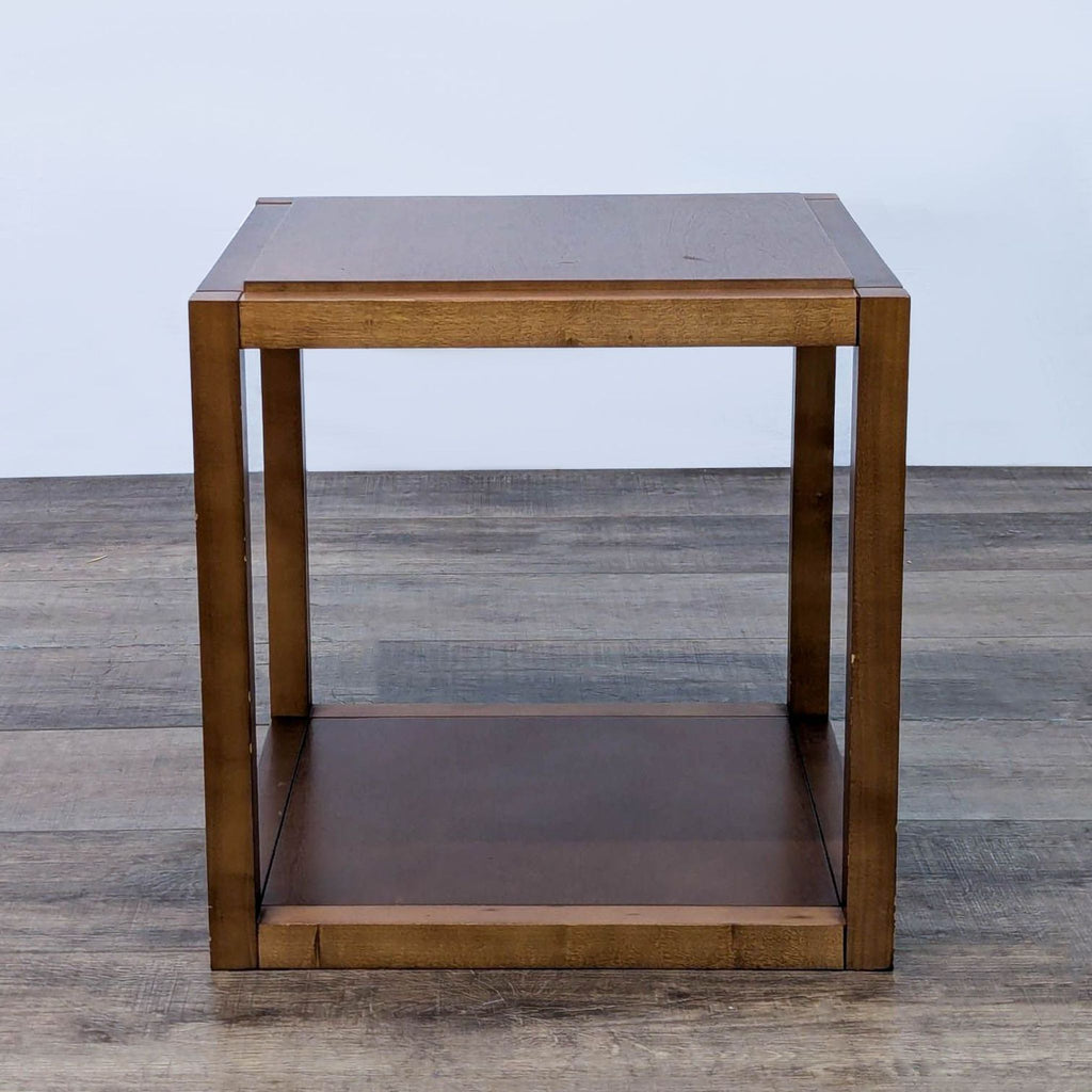 Reperch wooden end table with a simple square design and clean lines.