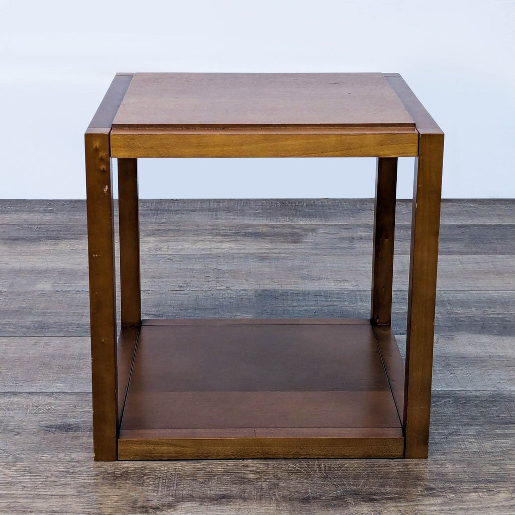 Wooden end table by Reperch, featuring a minimalist square shape and lower shelf.