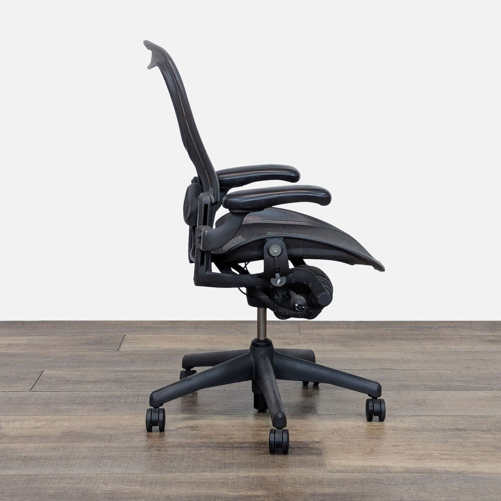 Side view of Herman Miller Aeron Chair showcasing ergonomic design.