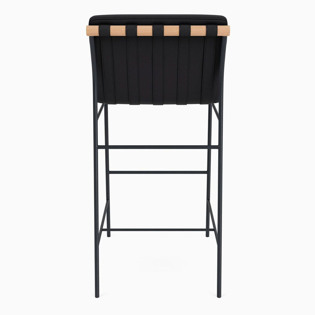 Back view of a stylish stool featuring leather upholstery and a steel frame.