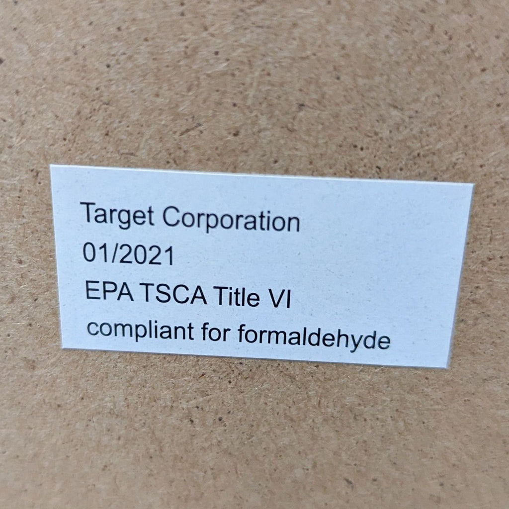 Label on the back of a mirror from Target, showing EPA compliance information.