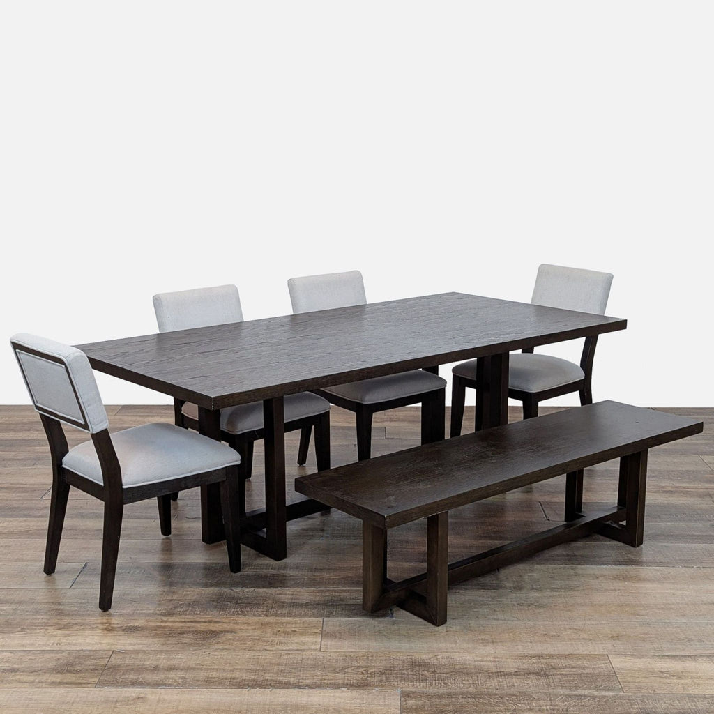 Dining set featuring a sturdy table, four chairs, and a bench in dark wood.