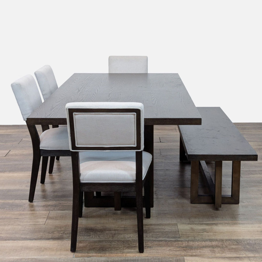 Elegant dark wood dining table with chairs and matching bench.