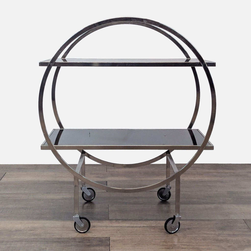 Modern cart with black glass shelves, metal frame, and smooth double caster wheels.