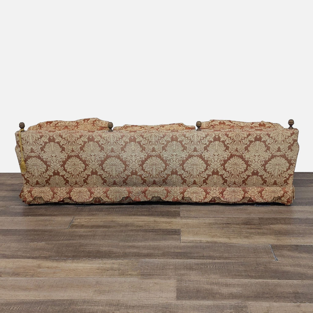 Elegant vintage 3-seater Henredon sofa with damask design and decorative wood spindles.