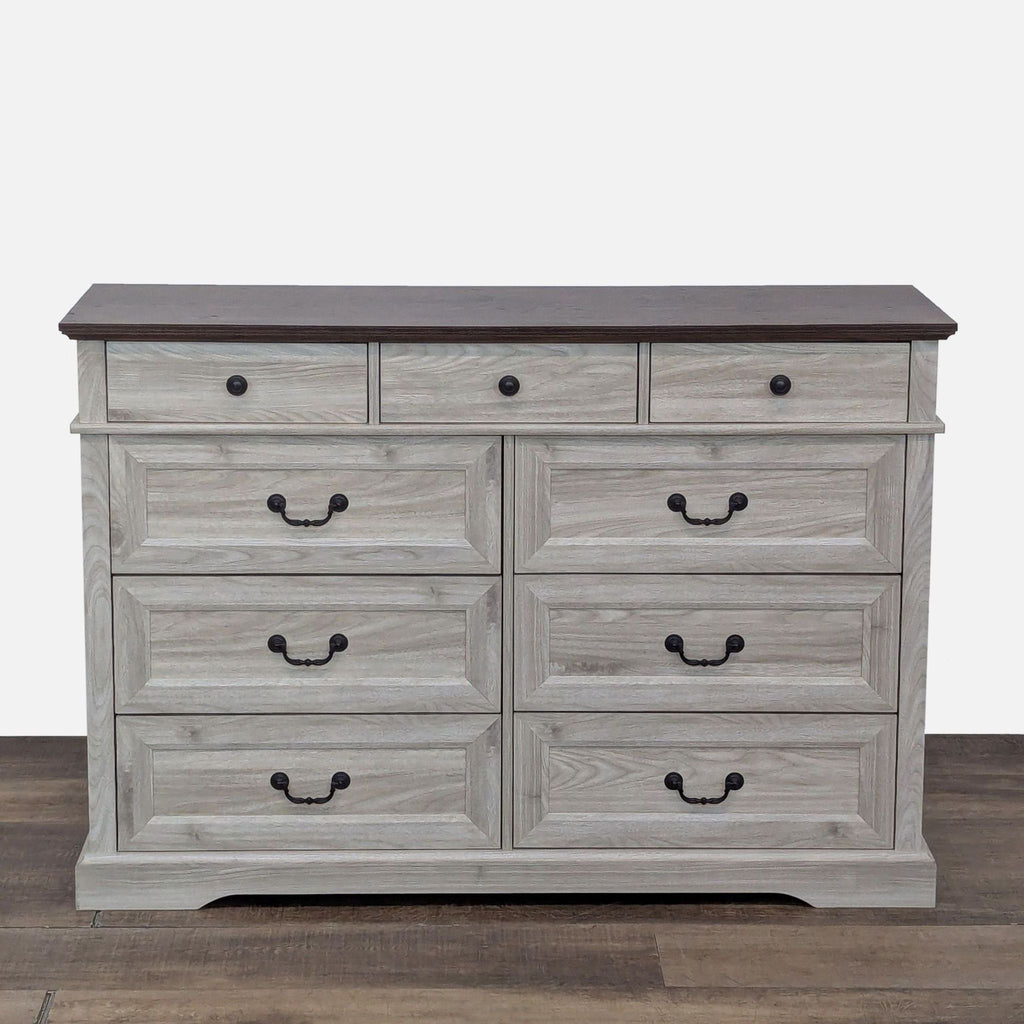 Linsay Home dresser with 9 drawers, metal glides, and antiqued handles.