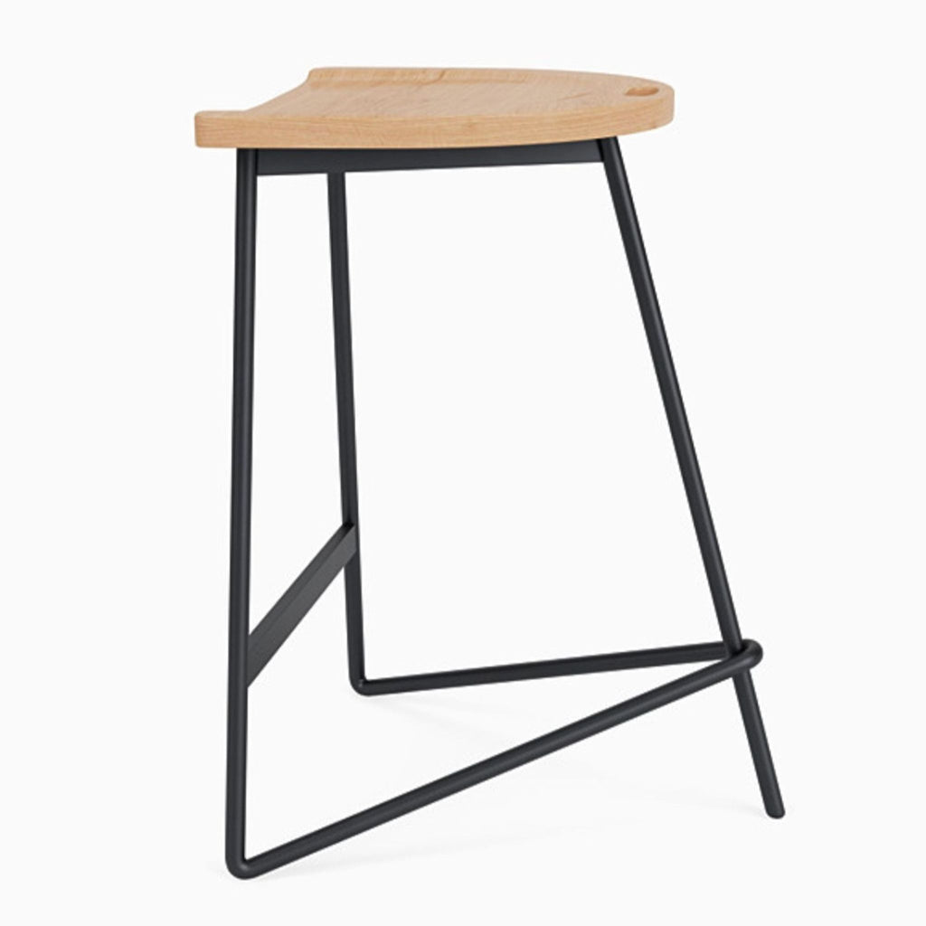 Side view of a Denver Modern stool featuring a form-fitting oak seat and powder-coated steel base.