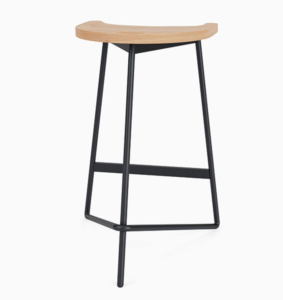 Angled view of Denver Modern's stool, highlighting its ergonomic oak seat and minimalist steel design.