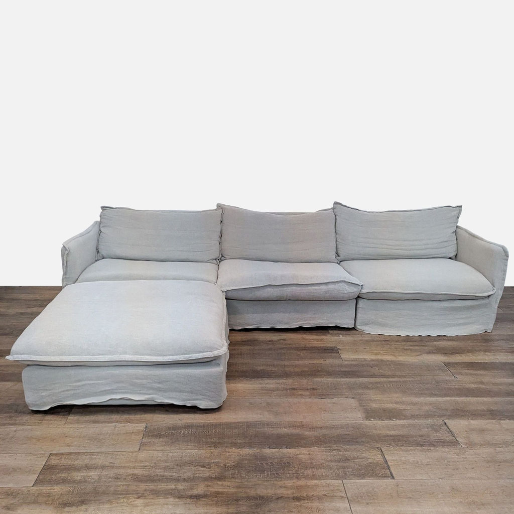 Neva Chaise Sectional with down cushions and linen-cotton blend slipcovers.